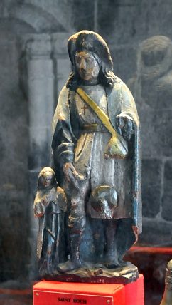 Statue de saint Roch montrant son bubon