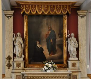 Le retable et les statues de saint Jacques et sainte Marthe